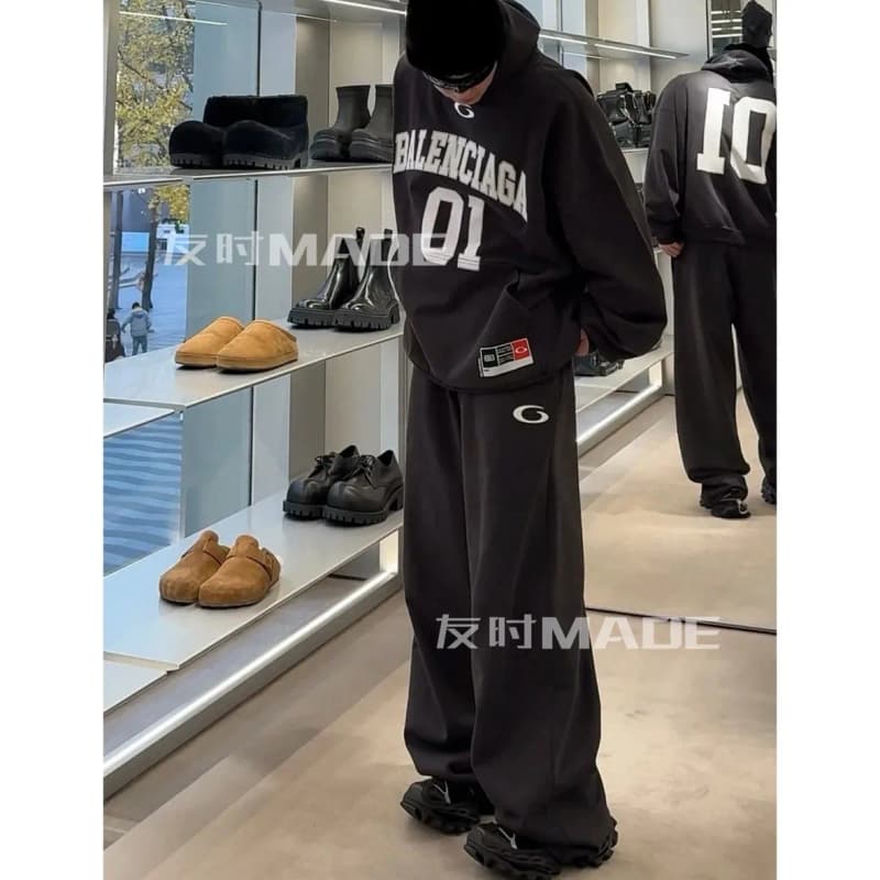 발렌시아가 중공정 워싱 벨벳 자수 조절 스트링 조거 스웨트팬츠 3
